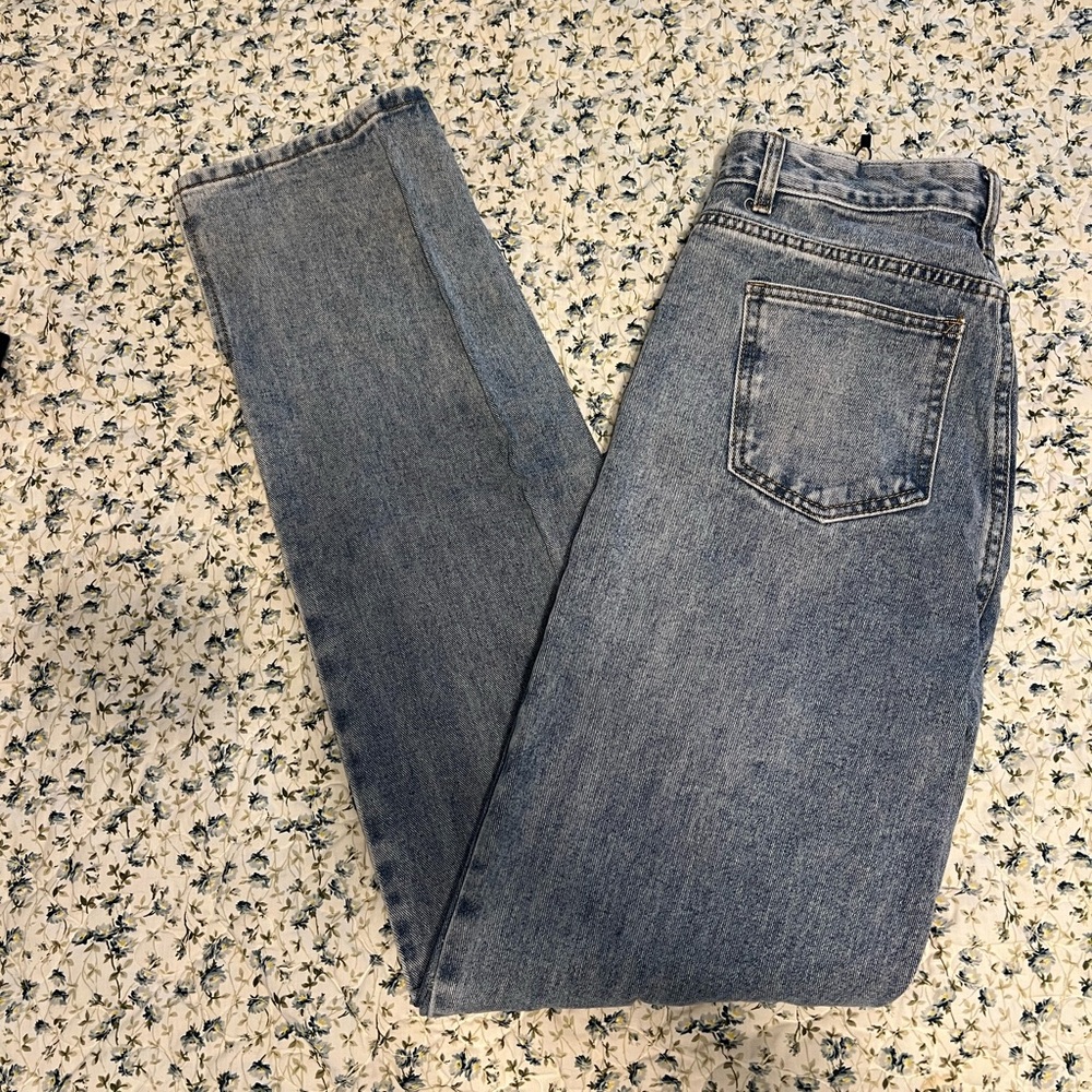distressed jeans by PrettyLittleThing